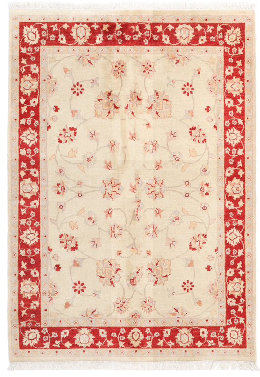 Decorative rug with red and beige floral pattern