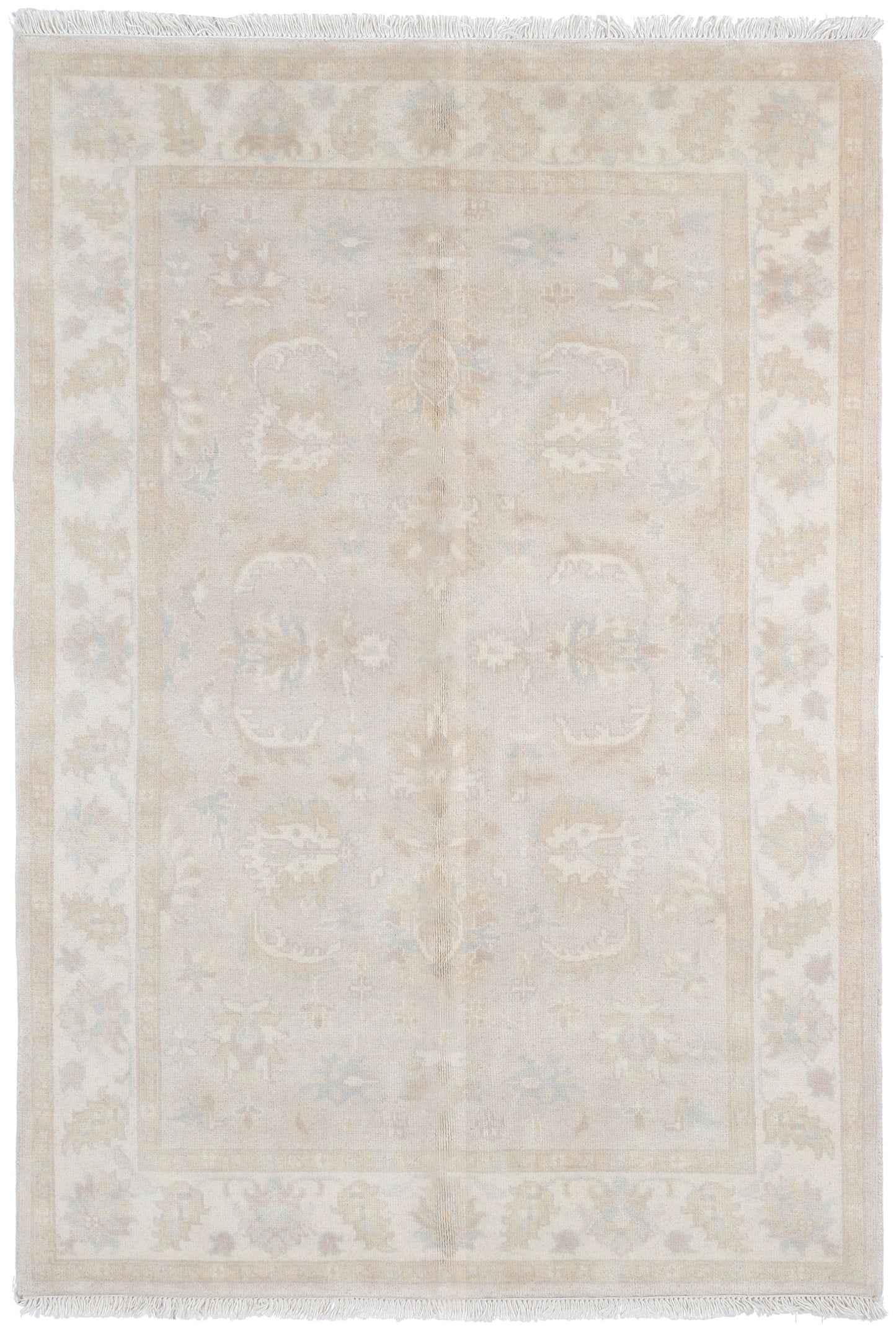 Beige area rug with subtle pattern on a white background