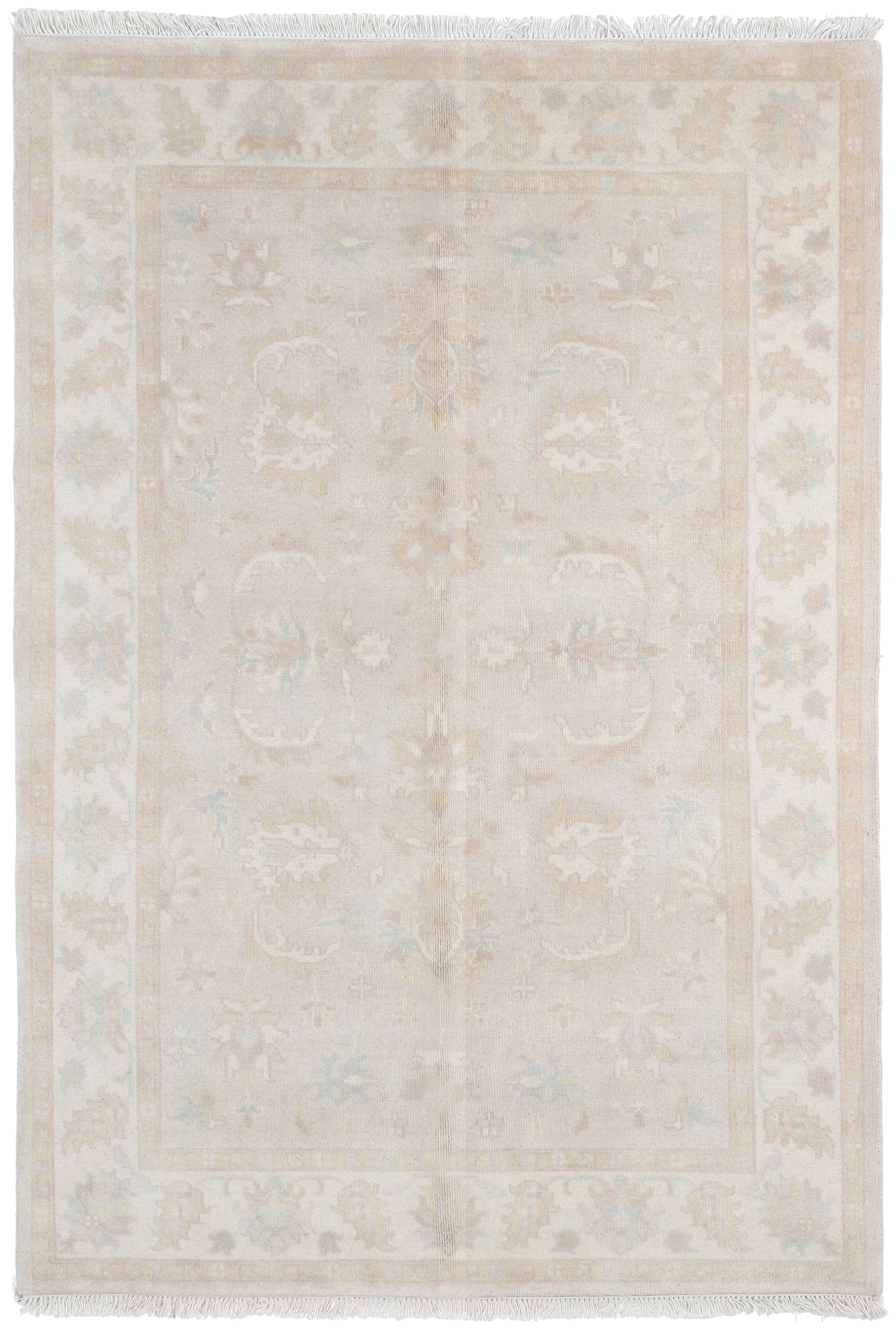 Beige area rug with subtle pattern on a white background