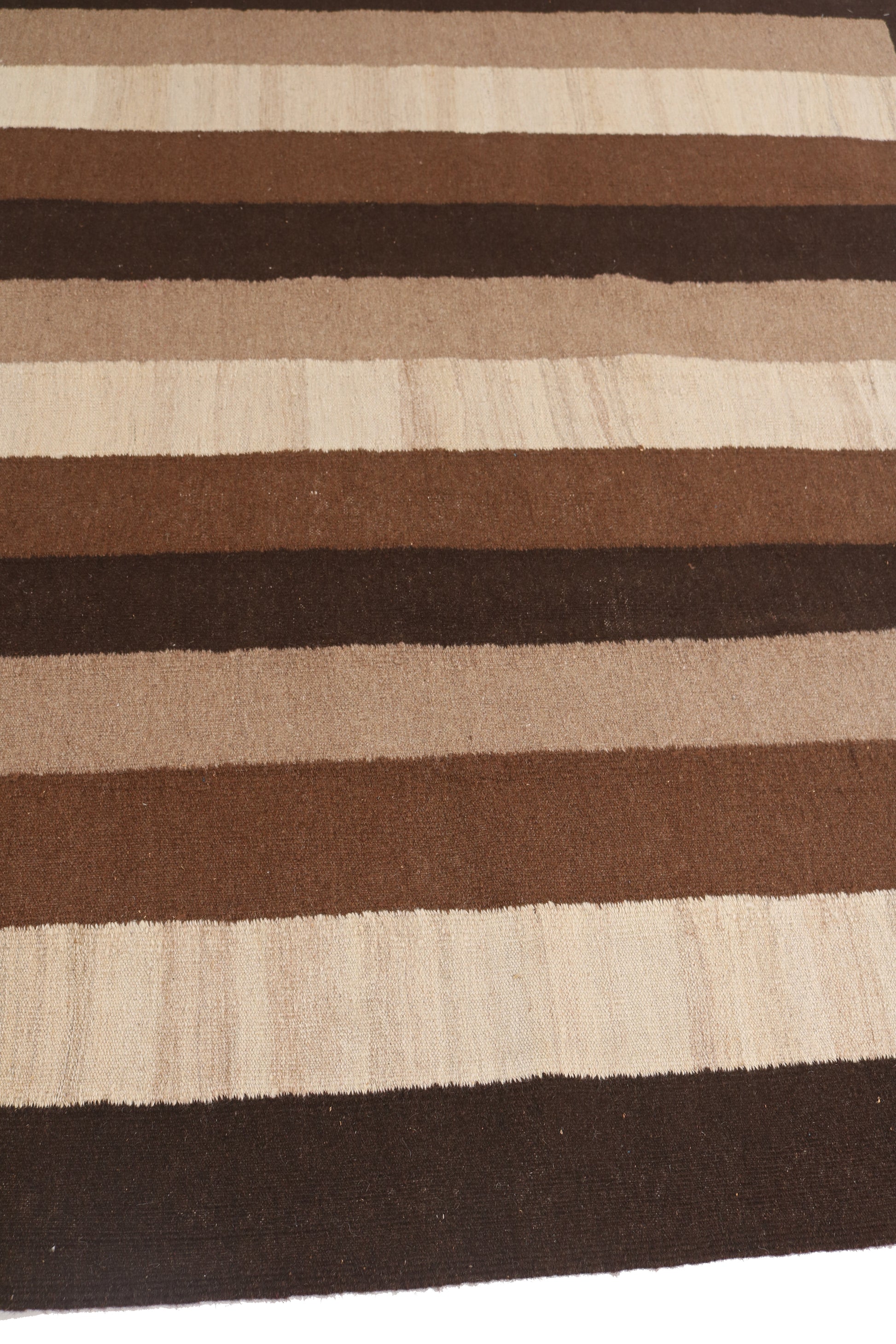 Striped rug with brown and beige horizontal stripes on a white background