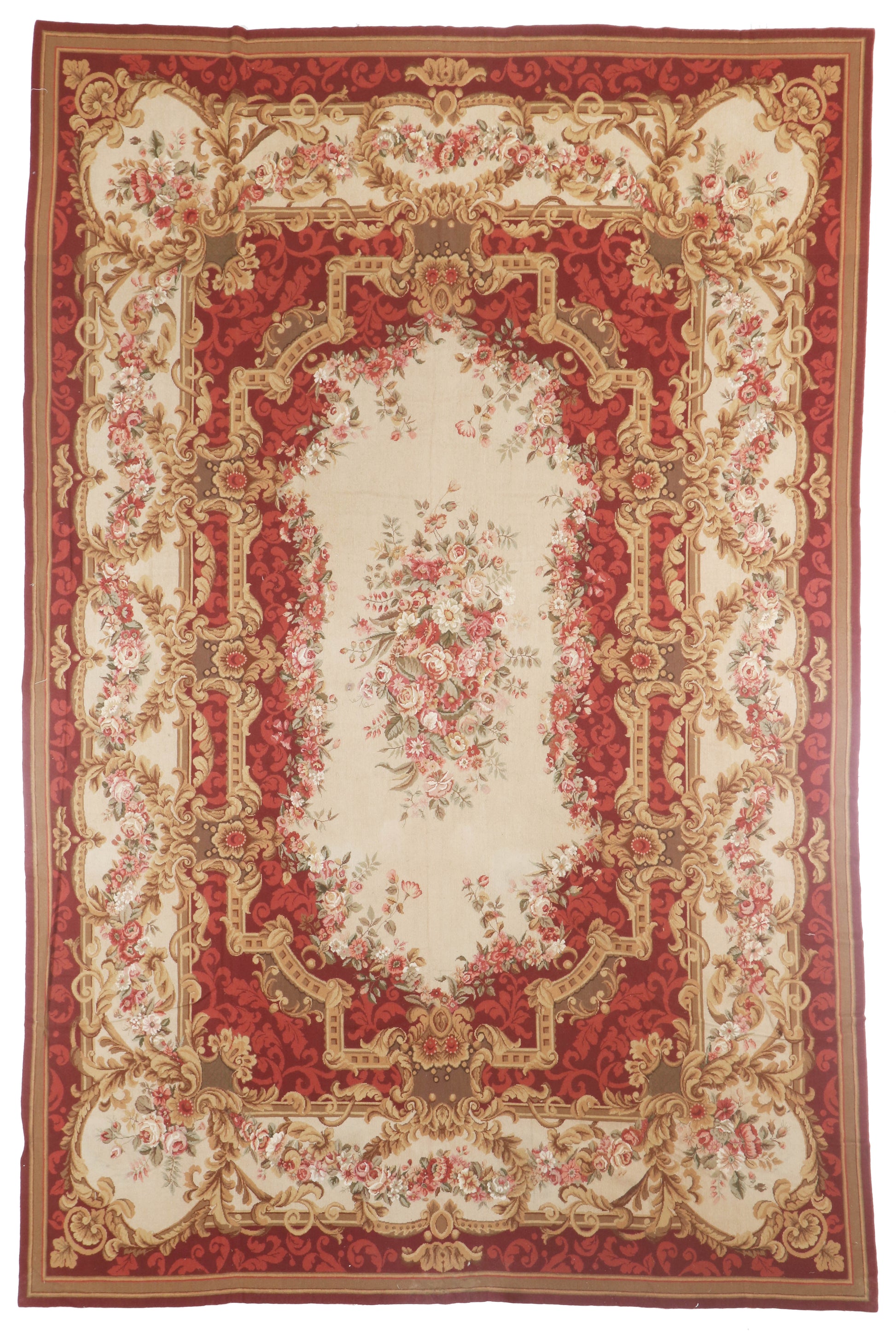Decorative red and beige area rug with intricate patterns