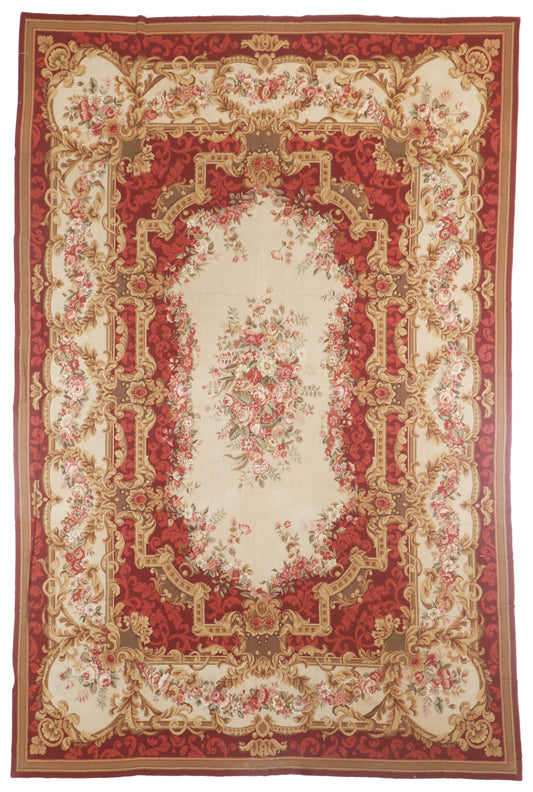 Decorative red and beige area rug with intricate patterns