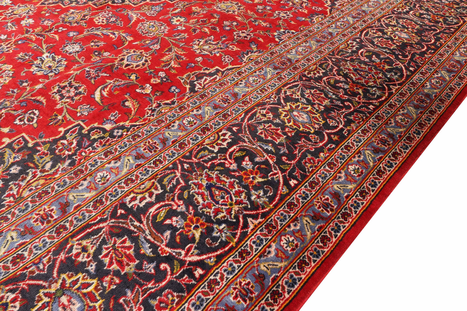 Close-up of a red and black patterned rug
