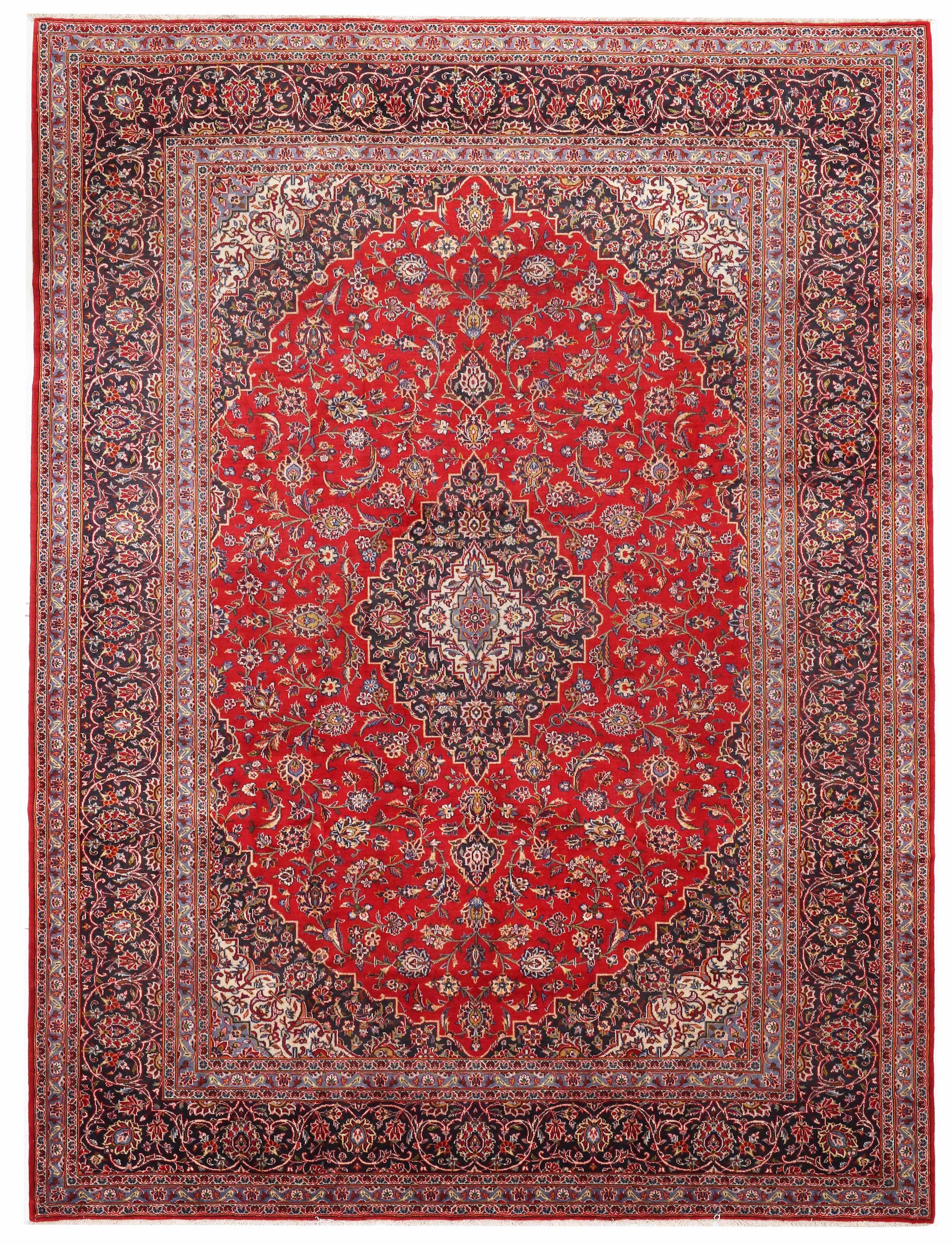 Decorative red rug with intricate patterns on a plain background