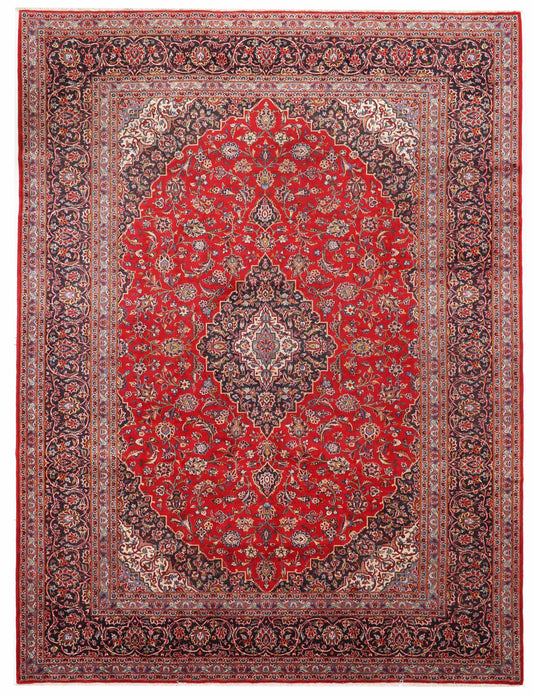 Decorative red rug with intricate patterns on a plain background