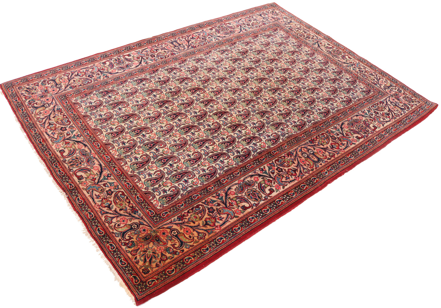 Decorative red and patterned rug on a white background