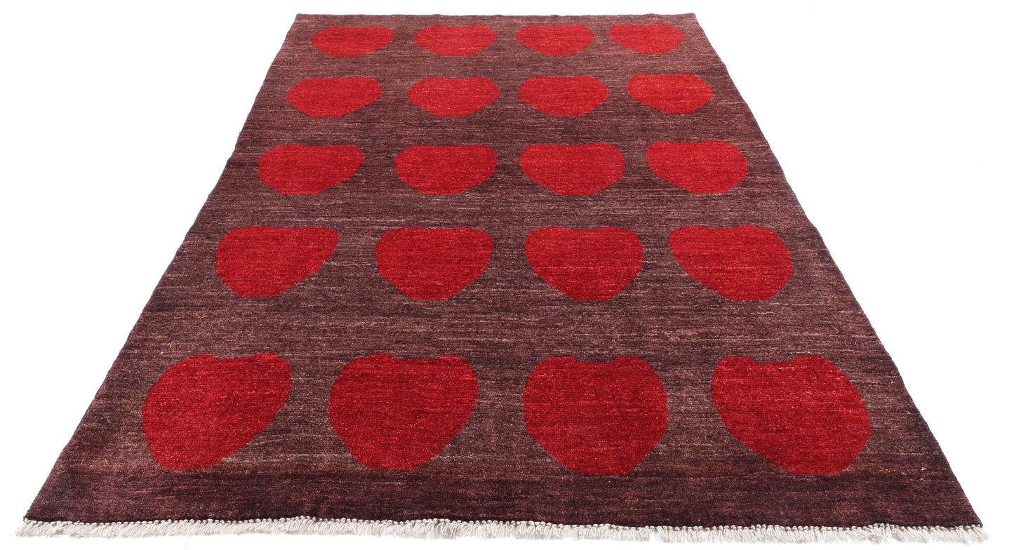 Lifestyle view of a thick-pile heart design rug in a modern London interior, ideal for photography shoots and TV sets.