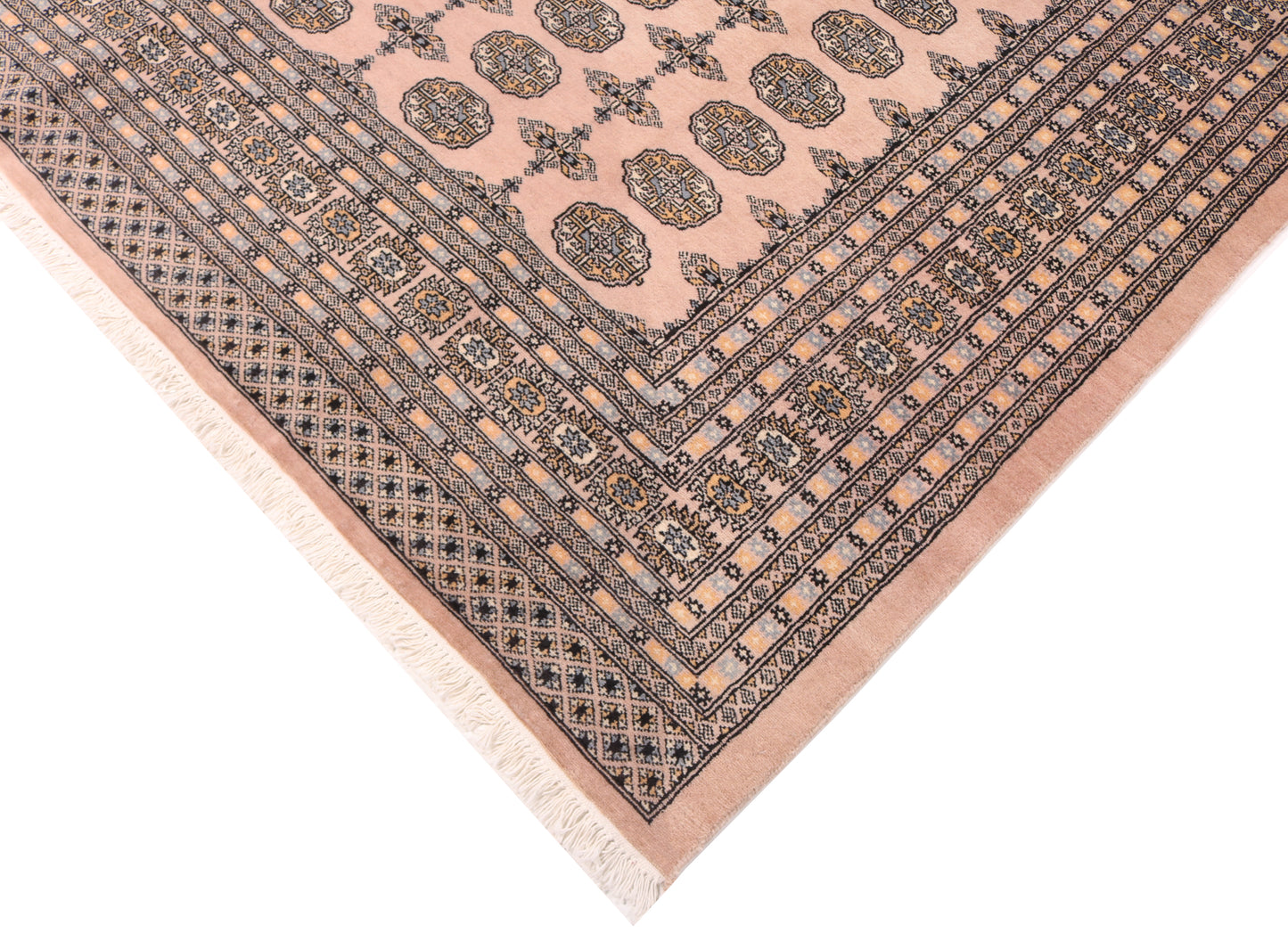 Close-up of a patterned rug with a pink and black design on a white background
