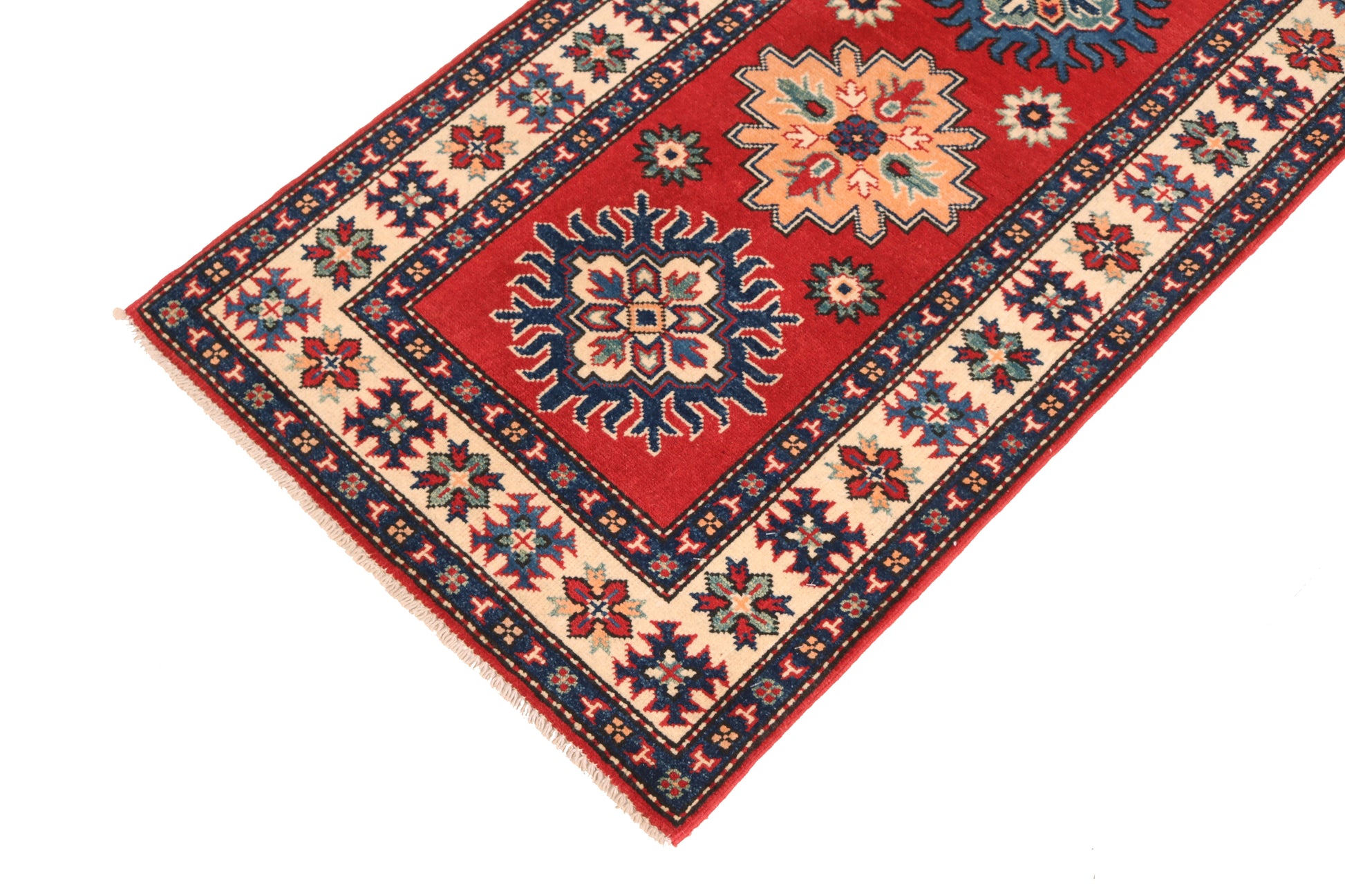 Decorative rug with intricate patterns on a white background