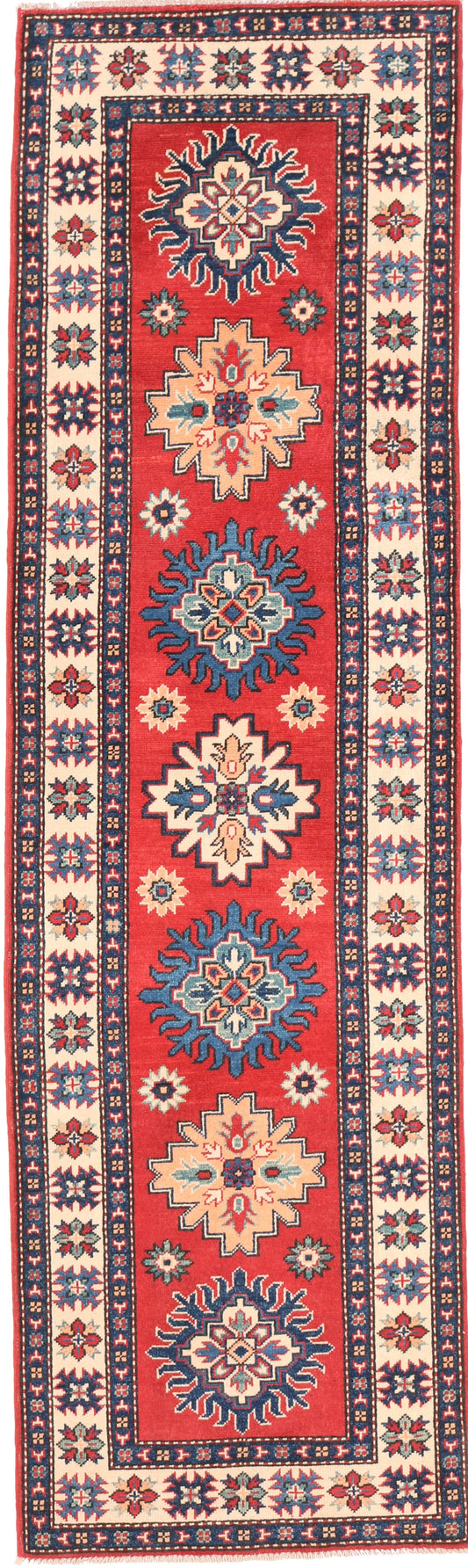 Decorative rug with geometric pattern on a red background