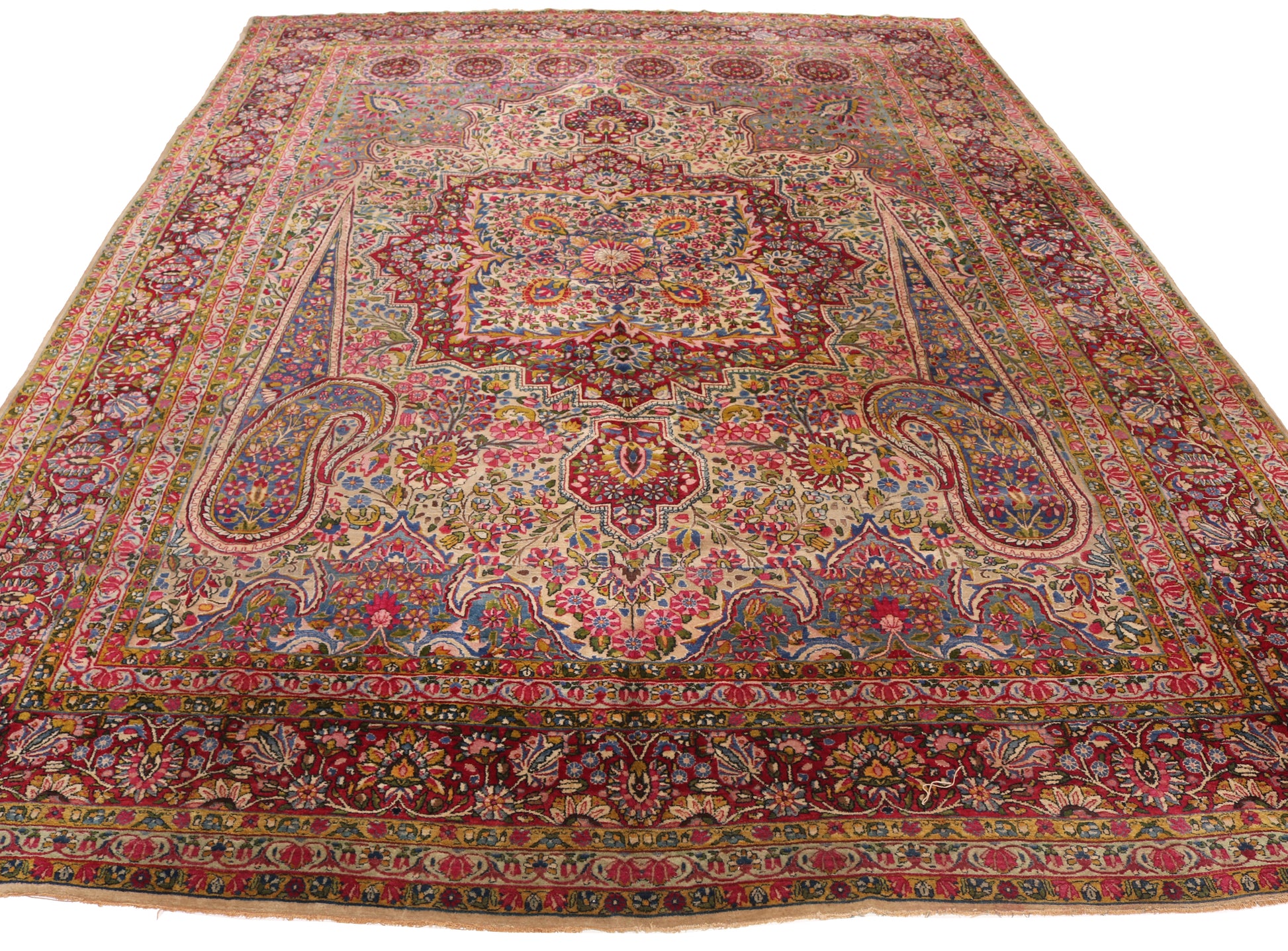 Wide-angle view of a 13x9ft traditional antique rug, showing the expansive pattern and scale suitable for grand event halls and film sets.
