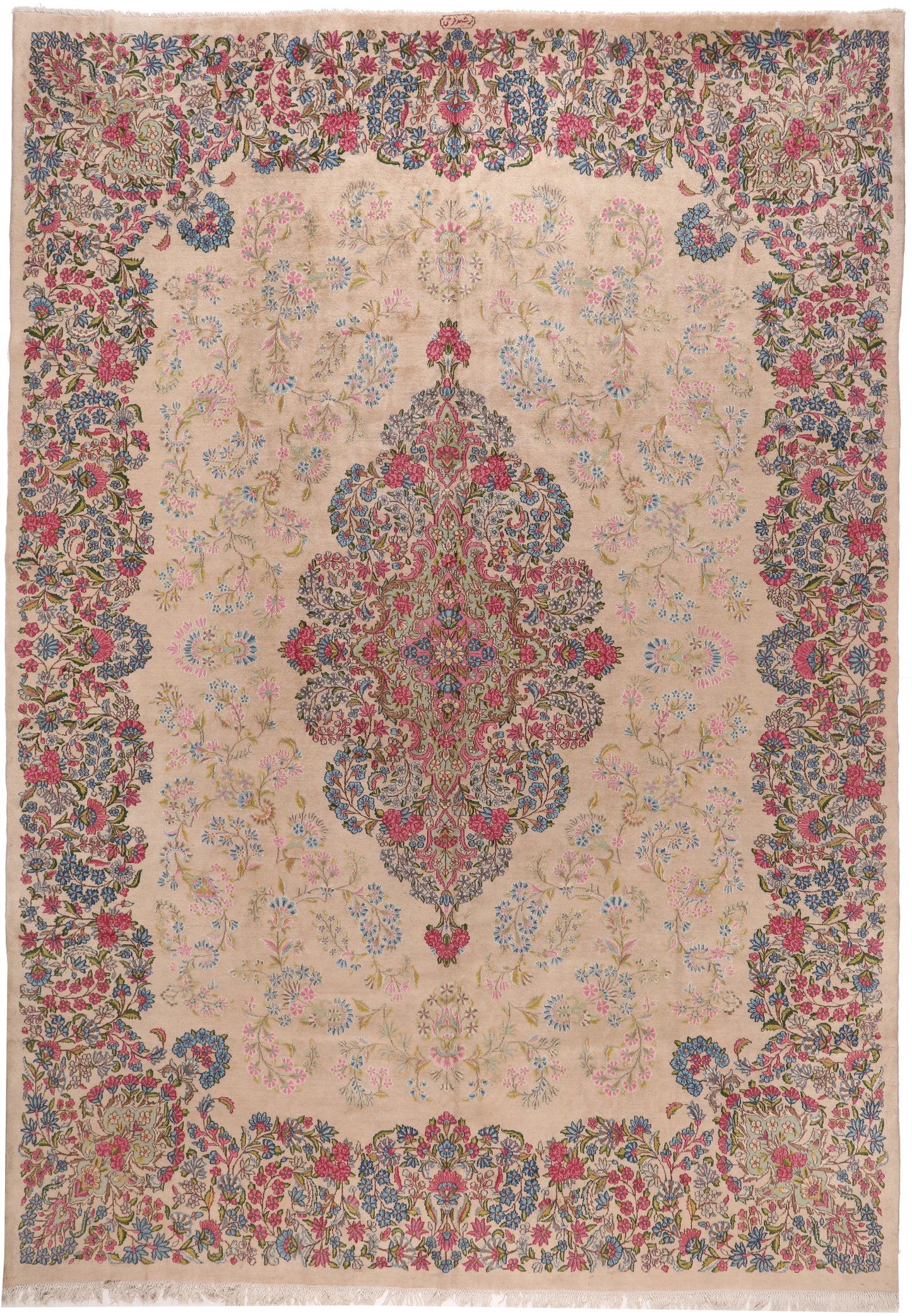 Decorative rug with intricate floral patterns and a central medallion on a beige background.