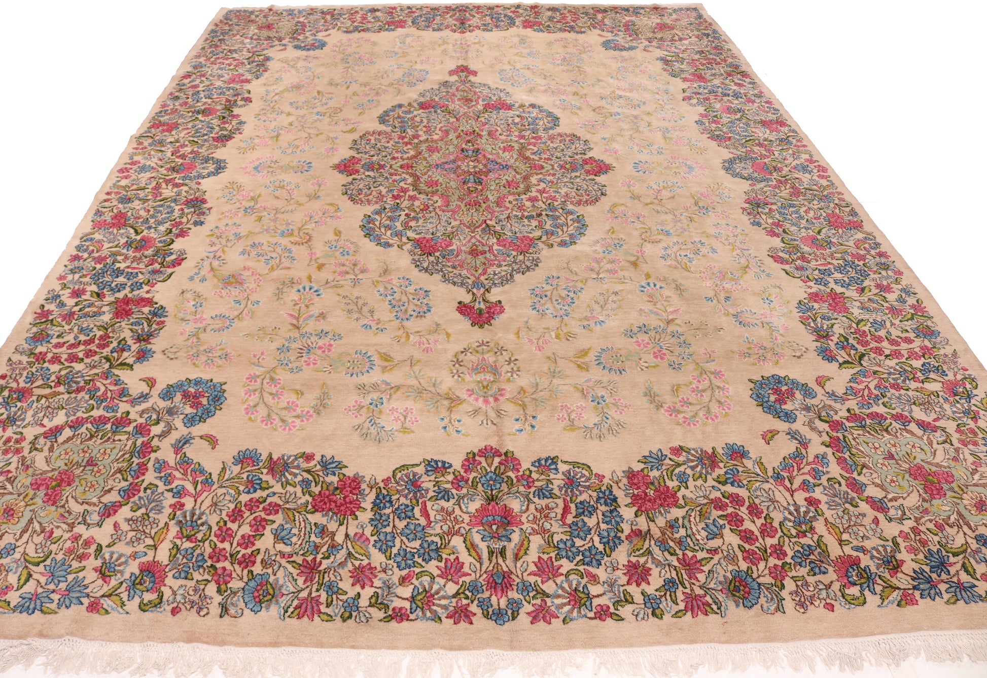 Decorative rug with intricate patterns on a beige background